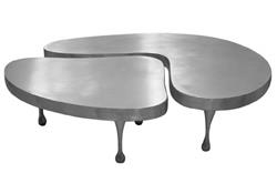 coffe table in cast aluminium designed by Frederick Kiesler in 1935 and shown in the new York apartment of fabric designer Alma Mergentine. 37" x 25" x 9.5"H 631-722-37733 palazzett@aol.com